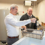 LIFE AQUATIC: Water-recycling firm AquasGroup services a variety of companies, including jewelry manufacturers, toolmakers and marinas. Pictured above are Rob Sheldon, left, vice president of sales and marketing, and Nicholas Paolo Jr., company president. / PBN PHOTO/TRACY JENKINS