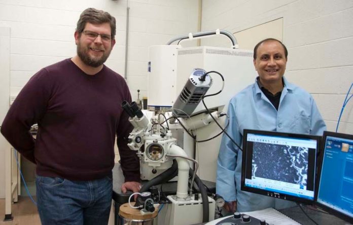 CLEAN SLATE: URI engineering assistant professor Geoff Bothun, left, and professor Arijit Bose are developing new technologies for cleaning oil spills. / COURTESY CHRIS BARRETT