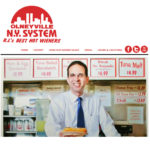 OLNEYVILLE NEW YORK System was one of five restaurants nationwide to receive a 2014 America's Classics Award from the James Beard Foundation. Above, Providence Mayor Angel Taveras poses with one of the diner's signature weiners in a photo featured on the restaurant's website. / COURTESY OLNEYVILLE NEW YORK SYSTEM
