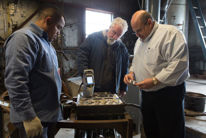 RHODE ISLAND ranked ninth in the U.S. for year-over-year manufacturing job growth, according to a study by Arizona State University. Above,  technician Hilario Tovar, foreman John Fullhart and owner Steve Kaplan of Hallmark Metals Corp. in Cranston. / PBN FILE PHOTO/RUPERT WHITELEY