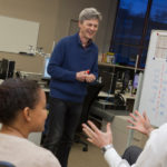 GOOD ENERGY: Smart-grid company Utilidata received $20 million in Series B-round financing in 2013.  Above, Utilidata CEO Scott DePasquale, right, speaks with his software team. From left: Gautham Krishnamurthy, Miriam Vera-Cruz and Svetlan Bzenic. / PBN PHOTO/CONNIE GROSCH