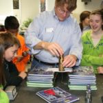 FROM THE STEM: Curtis Johnson of EMC visits the Douglas Intermediate School in Douglas, Mass., to speak about his work. He volunteered through DIGITS, a Massachusetts education program. / COURTESY DIGITS