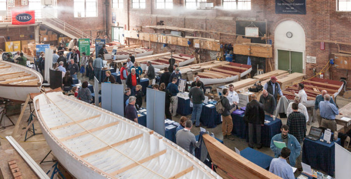 Company representatives mingle with job seekers and the curious during the ninth annual Marine & Composites Industry Career Day on March 22 at the IYRS Newport campus. Projects being built by students in the school’s Boatbuilding & Restoration Program are on display. An estimated 38 companies were expected at the event. / COURTESY JACK RENNER