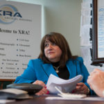 INTEREST IN FINANCE AND MORE: Lisa Salerno, the director of finance for XRA Medical Imaging Centers, is not afraid to tackle any task that helps keep the medical-service provider under control. / PBN PHOTO/CONNIE GROSCH