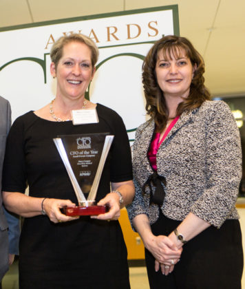 Mary Cooper, ChartWise Medical Systems accepts her award from Kristin Fraser, KPMG  / Rupert Whiteley