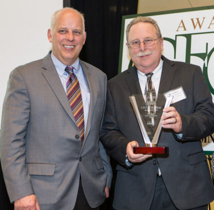 PBN Publisher Roger Bergenheim with CFO award recipient Kevin Barry, Quonset Development Corporation / Rupert Whiteley