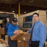 Fast delivery their ticket to growth MAKING CONNECTIONS: Easter Connection Operating Inc. was founded in 1983 with 18 packages and now delivers more than 20,000 packages a day. Pictured above are Eastern Connection General Manager Daren Lee, right, and driver Mark McDaniel. / PBN PHOTO/TRACY JENKINS