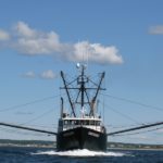 TO THE POINT: Point Judith fishing boat Karen Elizabeth steams out of Galilee on its way to the squid fishing grounds. / PBN PHOTO/JOHN P. LEE