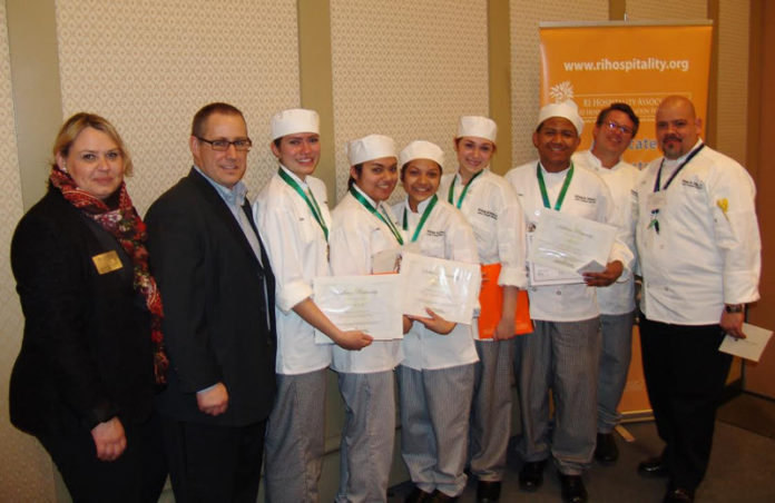 WINNING TEAMS will compete for nearly $1.4 million dollars in scholarship money at the ProStart Invitational National Competition this May, from left: Heather Singleton, senior vice president, Rhode Island Hospitality Foundation; Jesse James, US Foods; William M. Davies Career & Technical High School students: Maria Jacobo, Cesia Lapop, Osiris Hernandez, Elise Calhoun and Reymy Pena with chef Peter Fangiullo and chef Santos Nieves, school culinary teachers.