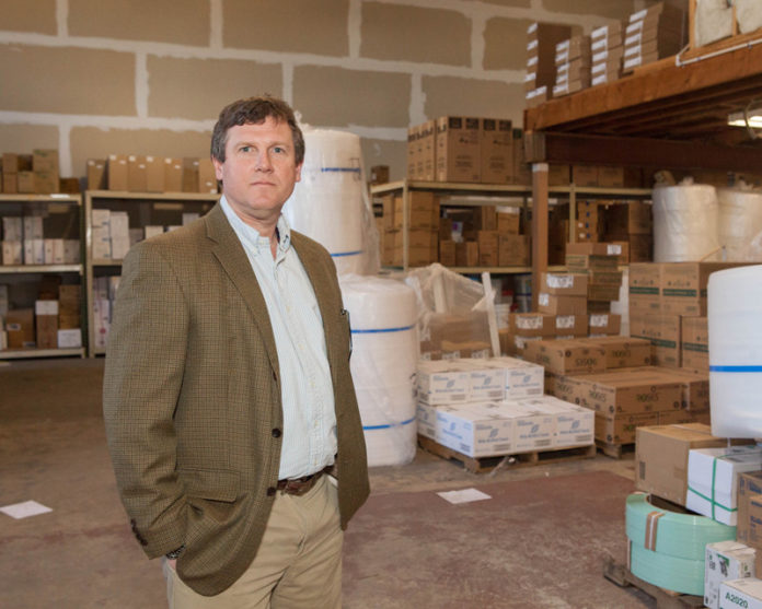From the boom years of the 1990s to the Great Recession, Bristol’s TJ Russell Supply has relied on customer service to help it stand out from competitors. “That’s sort of our niche – that personal service,” said owner Erik Warner, pictured above. “[We] take pride in finding the best, most economical solutions for [customers’] supply needs and we like to do it on a personal level.” The wholesale cleaning-supply business, now in its 43rd year, offers approximately 5,000 different products. And most of its business is still done by what some would consider old-fashioned methods – through email, phone and fax. / PBN PHOTO/TRACY JENKINS