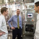 GROWING CAPABILITIES: Todd Blount, center, president of Blount Fine Foods since 2000, has invested heavily in the food manufacturer&rsquo;s ability to adapt to the fast-changing consumer food marketplace, including by supporting fast product development by the company&rsquo;s research and development team, including R&D chefs Benjamin Murray, left, and Thomas Gervasi. / PBN PHOTO/RUPERT WHITELEY