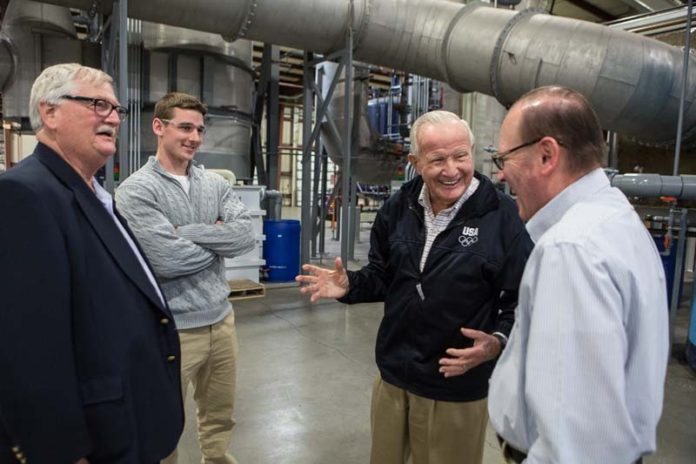 CLEANING UP: Gannon & Scott is finding that its environmentally oriented business practices are in line with many industries, and support its growth plans. Pictured above at the company’s new $8 million processing facility in Cranston are, from left, company Executive Vice President and Chief Financial Officer John King, plant manager Brian Walker, President John Gannon and Engineering & Compliance Manager Matthew Fischer. / PBN PHOTO/RUPERT WHITELEY