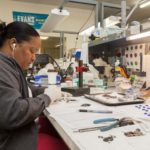 Capacitor builder invents its way to success POWERFUL PIECES: Sandar Osorio assembles capacitors for East Providence-based Evans Capacitor, a producer of electronic components with exacting customers in the aerospace and defense industries. / PBN PHOTO/TRACY JENKINS