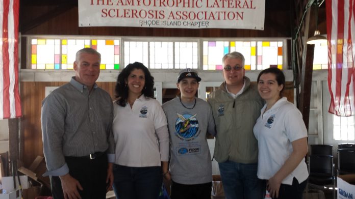MAYOR SCOTT AVEDESIAN, left, stands at the award ceremony on April 19 with Scott Carlson Memorial Road Race 5K Chairwoman Judy Pratt, her husband and event committee member Jon Pratt, and their children, Alex and Samia. The event helped the Rhode Island chapter of the ALS Association pass the half-million dollar mark for fundraising. / COURTESY NANCY FEROLDI