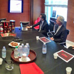 GOV. LINCOLN D. CHAFEE, third from right; Marcel A. Valois, far right, executive director of the R.I. Commerce Corporation; and GTECH Chairman Donald R. Sweitzer, second from right, meet with executives of Kimbo in Naples, Italy, on April 28. / COURTESY MICHAEL MCLAUGHLIN