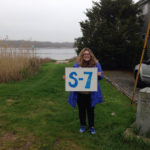 CRMC spotlights rights of way THE RIGHT TOOLS: Emily Robinson, an intern with the Coastal Resources Management Council, at the North Street ROW in Bristol. / COURTESY COASTAL RESOURCE MANAGEMENT COUNCIL