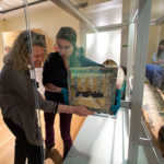 THE $8.4 MILLION RISD MUSEUM renovation includes galleries dedicated to ancient Egyptian and Asian art, as well as new spaces for the exhibits of costumes and textiles. Above, RISD Museum Conservator Ingrid Neuman, left, Lead Museum Technician Laura Ostrander handle Egyptian art in the museum. / COURTESY RISD MUSEUM