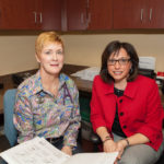 PIECING IT TOGEtHER: Omega Medical Research Vice President Lynne Haughey, left, and President and CEO Johnna A. Pezzullo met in 1987 as nurses at Roger Williams Medical Center, forming their company six years later. / PBN FILE PHOTO/TRACY JENKINS