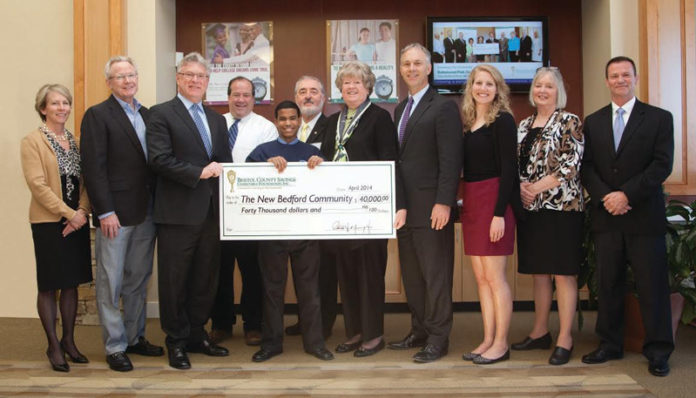BRISTOL COUNTY SAVINGS BANK is a true community partner in New Bedford,” said Mayor Jon Mitchell, fourth from right, who took part in a city grant presentation along with Patrick J. Murray Jr., third from left, president of the Bristol County Savings Bank and Jean MacCormack, fifth from right, chairwoman at the BCSCF Southcoast Advisory Board, BCSB board member and former UMass Dartmouth chancellor.