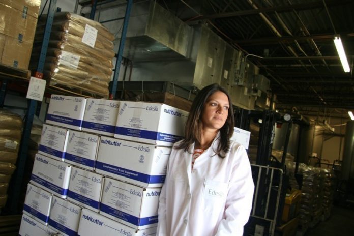 EDESIA INC. will relocate to Quonset Business Park from Providence after constructing a new 85,000-square-foot facility there. Edesia Executive Director Navyn Salem, pictured above, said Quonset's site-readiness program was critical to the nonprofit's decision to make a 25-year lease commitment. / PBN FILE PHOTO/MICHAEL PERSSON