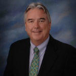 MODEL CITIZENS: Neil M. Stamps, CEO of the Girl Scouts of Rhode Island Inc., said the organization needs to get the word out that it is &ldquo;more than just camp and cookies.&rdquo; / COURTESY GIRL SCOUTS  OF RHODE ISLAND