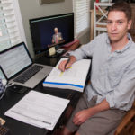 COURSE WORK: John Clarke just graduated with a law degree from Roger Williams University School of Law after participating in the Corporate Counsel Clinical Externship Program, where companies give hands-on experience in corporate legal work in exchange for academic credit. / PBN PHOTO/MICHAEL SALERNO