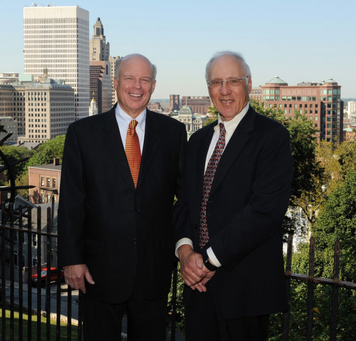 PLAYING BIG: E. Colby Cameron, left, and Richard Mittleman founded their firm nearly three decades ago based on providing big-firm service in a more intimate setting, for clients and staff. / COURTESY CAMERON & MITTLEMAN