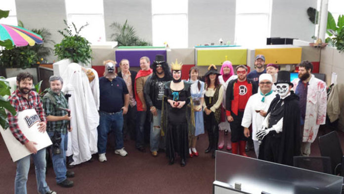 NO TRICKS HERE: Despite looking a little horrific all dressed up for Halloween, Envision Technology Advisors staff take the welfare of each other seriously. / COURTESY ENVISION TECHNOLOGY ADVISORS
