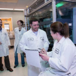 Rewarding work at Amgen, but benefits a draw, too IMPORTANT WORK: Aside from enjoying the perks that come with working for the company, employees at Amgen also take pride in their work to ease suffering. Pictured from left are: Senior Manager for Quality Control Adam Konow, specialist Danielle Paul, and Quality Control Managers Leo Espondle and Monika Soban.