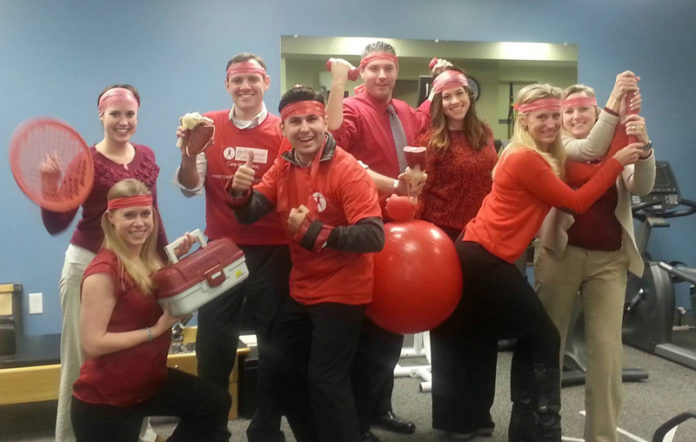 IT’S ABOUT HEALTH: An important aspect of Performance Physical Therapy’s culture is philanthropic awareness, combined with a sense of fun, which resulted in the East Greenwich office hamming it up on National Wear Red Day to highlight the risks of heart disease. / COURTESY PERFORMANCE PHYSICAL THERAPY