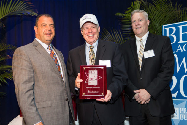 Founding Partner of Cameron &amp; Mittleman Colby Cameron accepts the award from Chris Santilli, PBN and Stephen Farrell, UnitedHealthcare / Rupert Whiteley