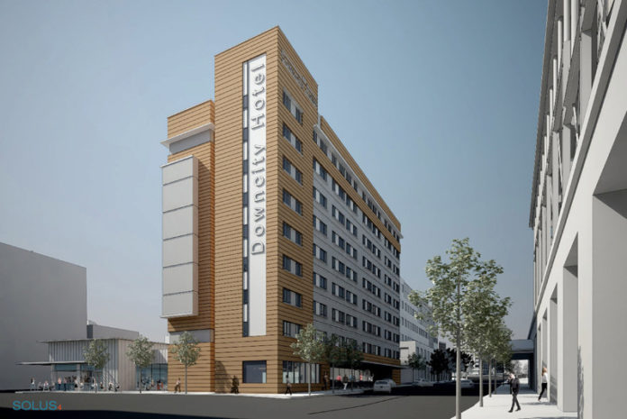 STAY A WHILE: A rendering of The Procaccianti Group’s proposed extended stay hotel, which would sit on the site that currently houses the vacant Fogarty Building. / COURTESY THE PROCACCIANTI GROUP