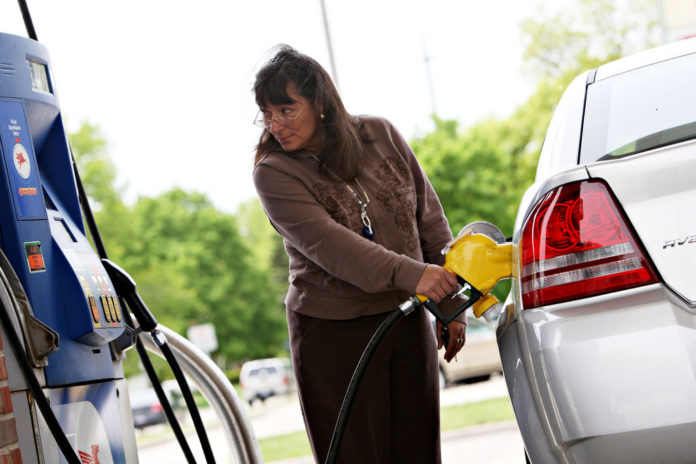 DESPITE A 1 CENT PER-GALLON DROP, Rhode Islanders are paying more for gasoline at this time of year since 2008, according to AAA Southern New England. / BLOOMBERG NEWS FILE PHOTO/DANIEL ACKER