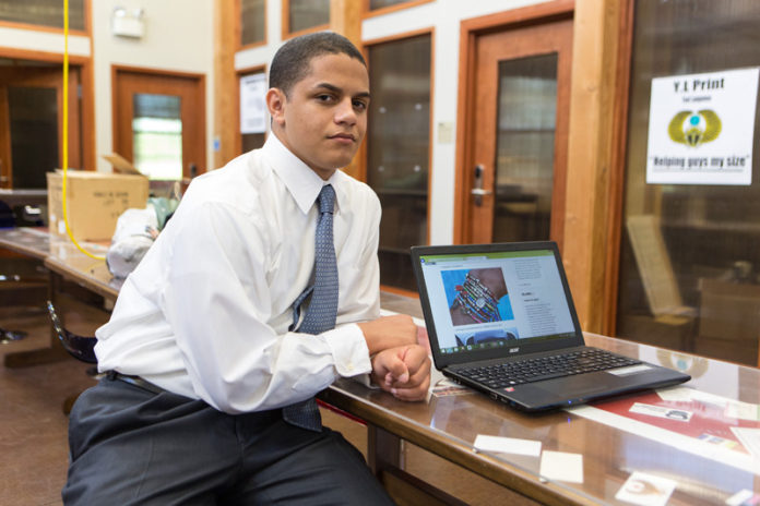 TOUGH PILL: Christian Rijos is launching a business as a school project at the Met school in Providence that encourages people to carry a potentially lifesaving dose of aspirin at all times. / PBN PHOTO/RUPERT WHITELEY