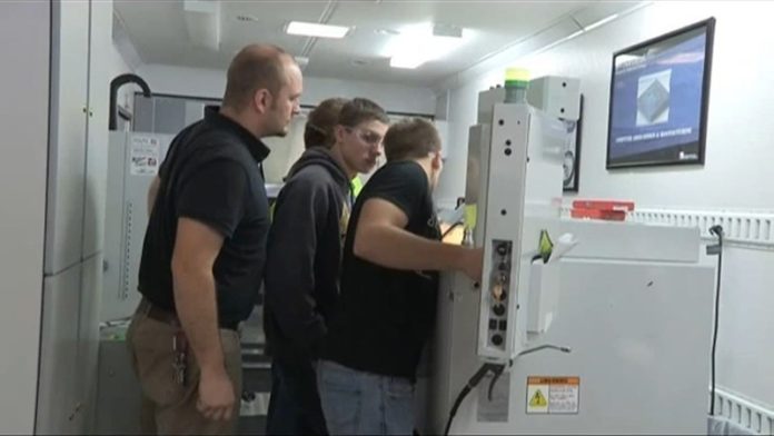 WELL-TRAVELED: High school students from Bonduel High School in Bonduel, Wis., work in an advanced-manufacturing mobile lab based at the Northeast Wisconsin Technical College in Green Bay. / COURTESY GERALD J. BRONKHORST
