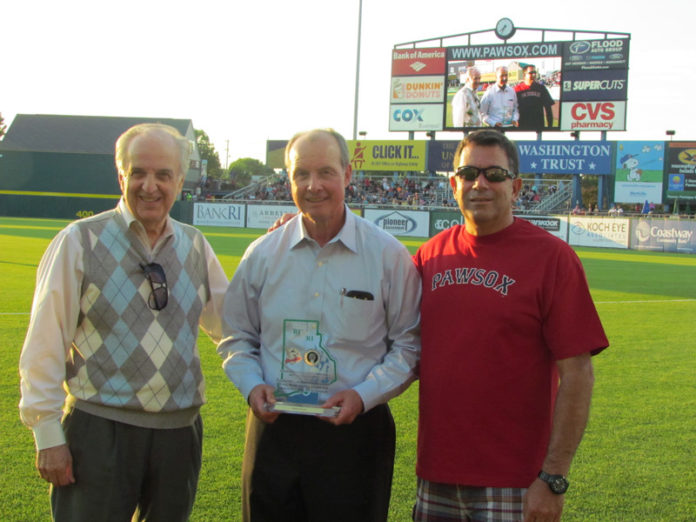 FROM LEFT: Guido Petrosinelli, Dunkin’ Donuts franchisee; Mike Tamburro, president, Pawtucket Red Sox and Joe Prazeres, Dunkin’ Donuts franchisee, receive the What’s Right About Rhode Island award at McCoy Stadium.