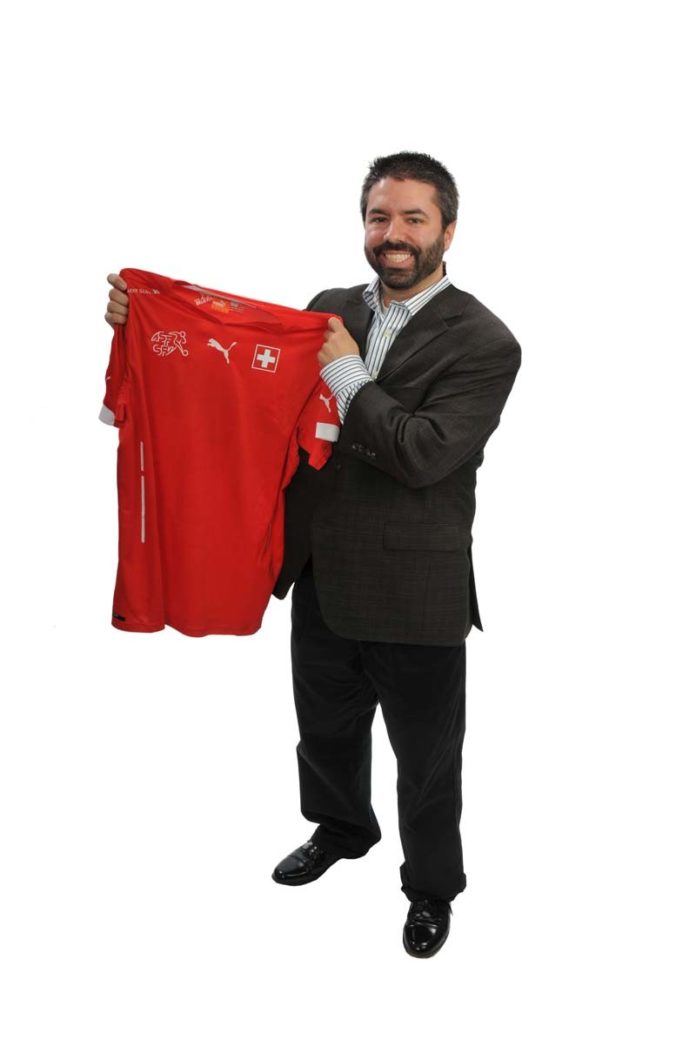 THE PROP: Since he’s also a citizen of Switzerland, Nicholas Delmenico brought along the country’s World Cup soccer jersey.