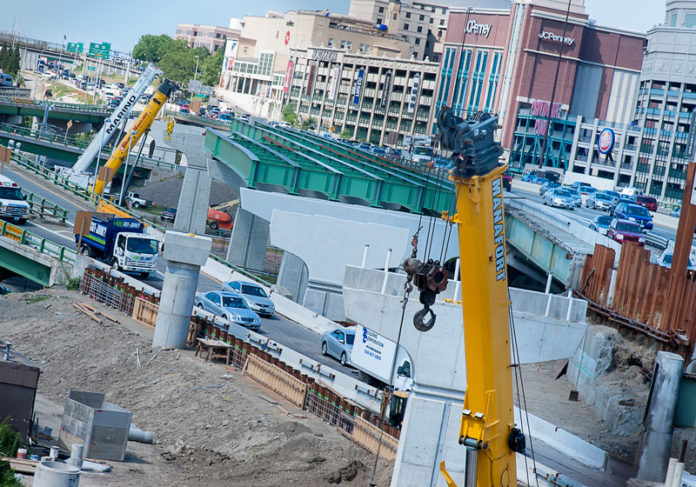A MODEST YEAR-OVER-YEAR increase in construction employment in July has not caused labor shortages in Rhode Island like the ones being experienced in other parts of the country. Here, construction on the Providence Viaduct proceeds in July. / PBN FILE PHOTO/MICHAEL SALERNO