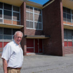 PRA is spurring rehabilitation projects A NEW LIFE? Providence Redevelopment Agency Executive Director Don Gralnek at the vacant former Flynn School. / PBN PHOTO/ MICHAEL SALERNO