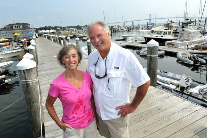 From yacht repairs done from the back of his truck and the family basement, Bill Munger built Conanicut Marine Services Inc. in Jamestown over four decades. Begun in 1974, the business now also includes a marina, boatyard, ship’s store and ferry service. And though the Great Recession took a financial toll, Munger, pictured above with his wife, Marilyn, sees hope for expansion, including adding a climate-controlled storage shed and possibly a third boat to his ferry fleet. / PBN PHOTO/KATE WHITNEY LUCEY