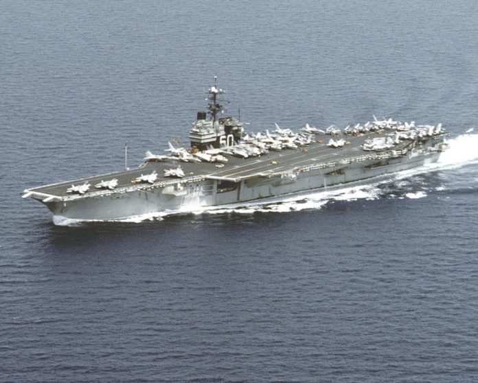 AN AERIAL view of the USS Saratoga from 1992. The decommissioned ship is currently en route to a scrapyard in Texas. / COURTESAY WIKIMEDIA COMMONS/BRUCE W. MOORE
