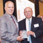 2014 Healthiest Employers Photos Roger Bergehein presents award to Navigant Credit Union CEO Gary Furtado / Rupert Whiteley