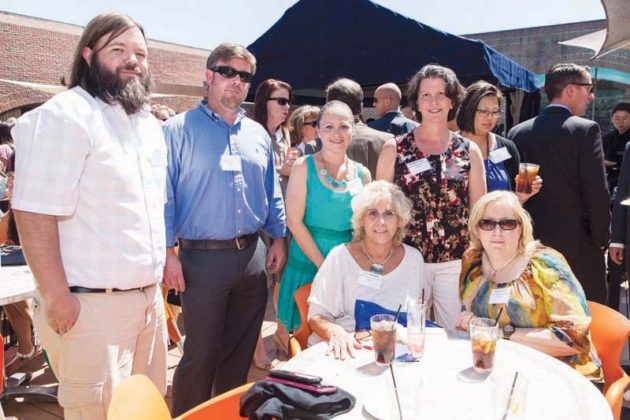 Moran Shipping VP and Wellness Manager, Michael Sullivan (Left) with his colleagues / Rupert Whiteley