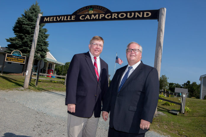 CAMPING OUT: Portsmouth Town Administrator John Klimm, left, and Finance Director Jim Lathrop at the Melville Ponds Campground. The town is looking for proposals for an operator to pay rent and share revenue. / PBN PHOTO/KATE WHITNEY LUCEY