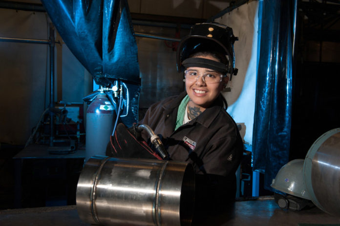 TRAINING DAYS: Katrina Thorson, a graduate of the Exeter Job Corps, is currently employed as a welder at General Dynamics Electric Boat at their Quonset Point manufacturing facility. / COURTESY ELECTRIC BOAT
