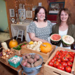 BUY LOCAL: New England Farm and Artists opened in 2013 as a way to “help support and build” community. Pictured above are Laurie Tapozada, left, owner of New England Farm and Artist in West Greenwich, and Renee LaPorte, of Delectible Edibles, with whom Tapozada shares the space. / PBN PHOTO/MICHAEL SALERNO
