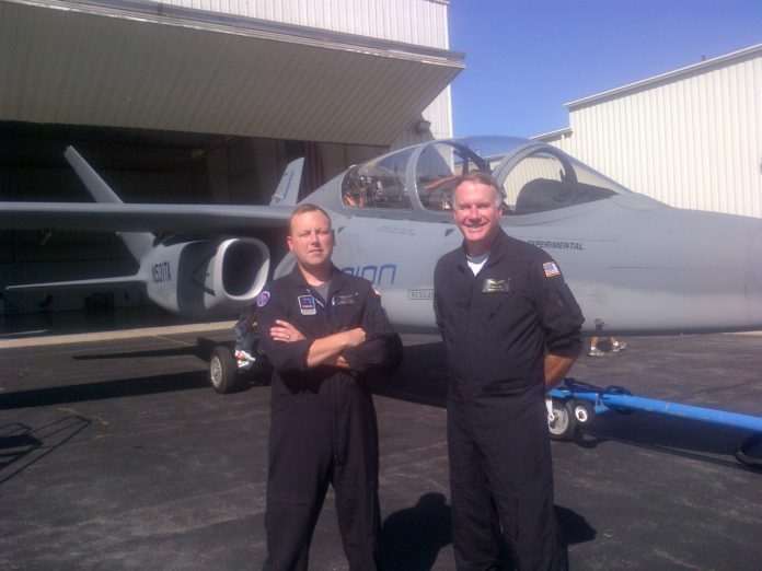 A GREATER VALUE: Textron test pilots Andy Vaughan, left, and Dan Hinson pose with the company's Scorpion fighter jet when it visited T.F. Green Airport recently. / COURTESY TEXTRON