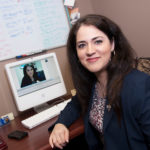 BEYOND LAWN SIGNS: Real estate agents have turned to SEO techniques to boost their image online. Julie Boyle, pictured above, of Re/Max Central in Coventry uses a video blog to boost her online visibility. / PBN PHOTO/ MICHAEL SALERNO