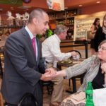 MEET AND GREET: Mayor-elect Jorge Elorza shakes hands with Zita Bolton at LaSalle Bakery the day after winning his race against Vincent A. "Buddy" Cianci Jr. / PBN PHOTO/ MICHAEL SALERNO