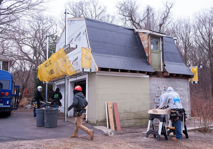 NEED BASED: Students at Warwick Area Career and Tech Center work on a building on Tollgate Road. Technical centers across the state are working on aligning education with future employment needs. / PBN PHOTO/MICHAEL SALERNO